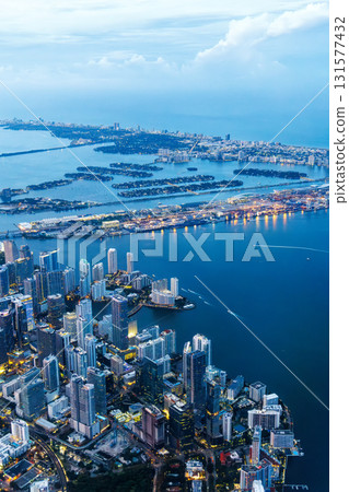 Aerial view of Miami skyline with skyscrapers at Downtown Brickell and Miami Beach at night  131577432