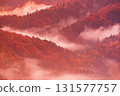 Misty autumn mountain landscape at sunrise in Slovenia 131577757