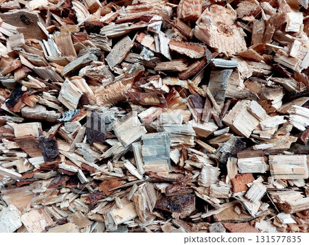 Chopped Wood Chips Ready for Use as Biofuel in Eco-Friendly Applications Chopped Wood Chips Ready for Use as Biofuel in Eco-Friendly Applications 131577835