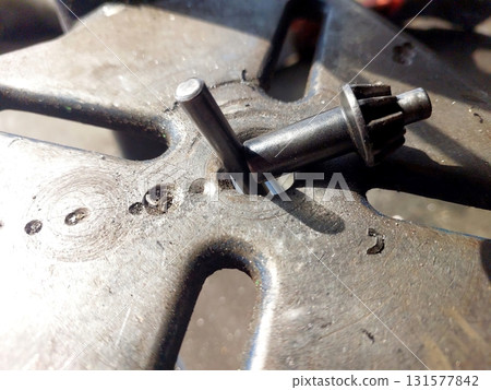 Drilling Machine Chuck Key Used to Adjust the Drill Bit in a Workshop Setting Drilling Machine Chuck Key Used to Adjust the Drill Bit in a Workshop Setting 131577842