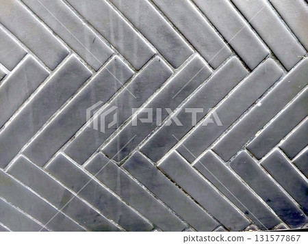 Black Zigzag Tile Pattern With Glossy Finish Ideal for Modern Interior Design Projects Black Zigzag Tile Pattern With Glossy Finish Ideal for Modern Interior Design Projects 131577867