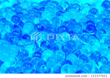 A blue background with many small blue spheres A blue background with many small blue spheres 131577931