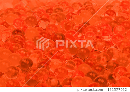 A close up of many red and orange balls A close up of many red and orange balls 131577932