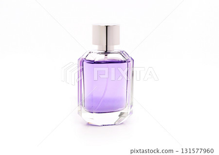 A bottle of purple perfume with a silver cap A bottle of purple perfume with a silver cap 131577960