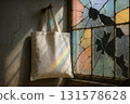 Fabric bag hanging near window 131578628