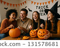 Friends carving pumpkins for Halloween 131578681