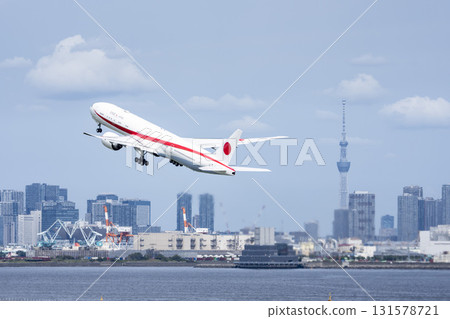 Autumn at Haneda Airport: Government plane taking off and Skytree in Ota Ward, Tokyo 131578721
