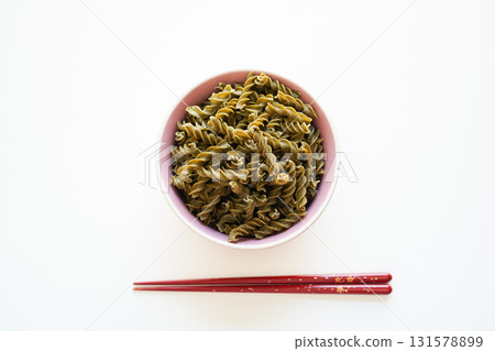 Gluten-free pasta made from seaweed in a bowl, overhead view 131578899