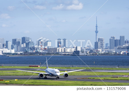 View of Haneda Airport, taxiing planes and Skytree, Ota Ward, Tokyo View of Haneda Airport, taxiing planes and Skytree, Ota Ward, Tokyo 131579006