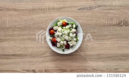 This video showcases vibrant salads with fresh, artfully displayed ingredients This video showcases vibrant salads with fresh, artfully displayed ingredients 131580124
