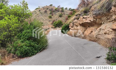 A scenic journey through majestic mountains invites natures beauty A scenic journey through majestic mountains invites natures beauty 131580132