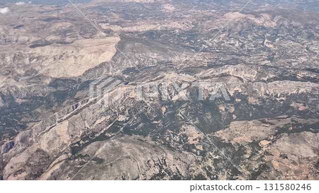 A stunning Aerial View of Mountainous Terrain showcasing a variety of Rocky Landscapes 131580246