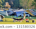 Tents set up on the large lawn 131580326