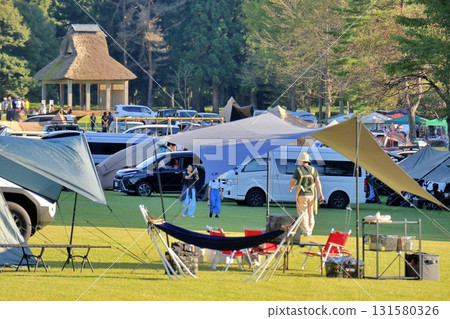 Tents set up on the large lawn 131580326