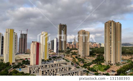 A vibrant modern urban skyline overlooking the latest developments in the bustling city 131580393