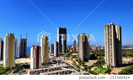 A Beautiful Modern Urban Landscape Featuring Skyscrapers Under a Bright Blue Sky A Beautiful Modern Urban Landscape Featuring Skyscrapers Under a Bright Blue Sky 131580424