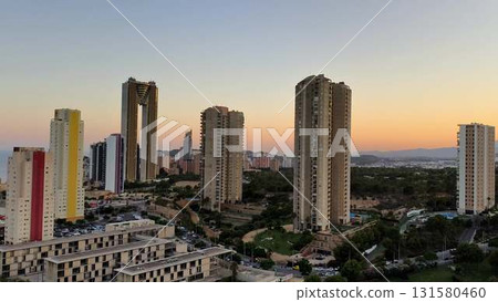 Stunning Cityscape at Dusk Featuring Majestic Skyscrapers and Colorful Vibrant Buildings Stunning Cityscape at Dusk Featuring Majestic Skyscrapers and Colorful Vibrant Buildings 131580460