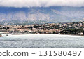 Breathtaking Coastal Panorama Featuring Majestic Mountains and Beautiful Cloudy Skies 131580497