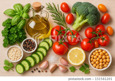 Flat lay of fresh vegetables and olive oil 131581201