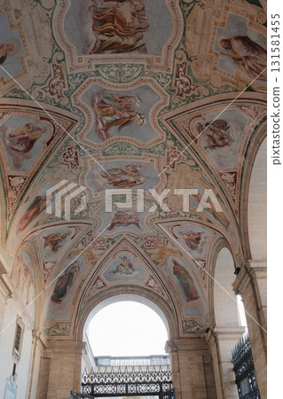 Archbasilica of Saint John Lateran Rome exterior facade and grand baroque interior with golden coffered ceiling vast nave marble statues side chapels ornate altar apse and dome Catholic basilica Archbasilica of Saint John Lateran Rome exterior facade and grand baroque interior with golden coffered ceiling vast nave marble statues side chapels ornate altar apse and dome Catholic basilica 131581455