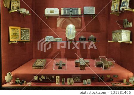 Vatican Museums treasury reliquaries embroidered vestments and devotional objects in showcase displays. High quality photo 131581466