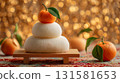 Kagami mochi and oranges decorated on a golden background: gorgeous Japanese New Year decorations 131581653