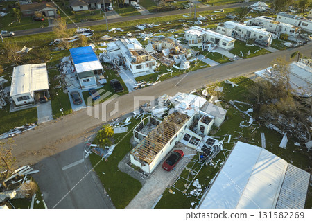 Badly damaged mobile homes after hurricane Ian in Florida residential area. Consequences of natural disaster 131582269