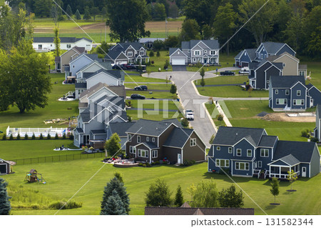 Aerial view of spacious new family houses in upstate New York suburban area. Real estate development in american suburbs 131582344