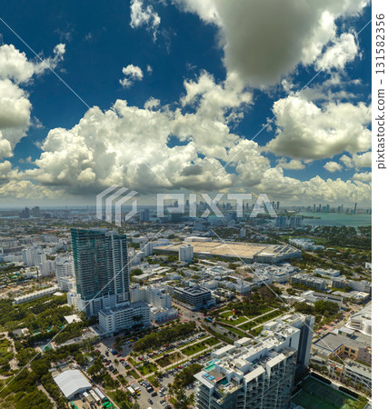 Aerial view of South Beach architecture. Miami Beach city with high luxury hotels and condos. Tourist infrastructure in southern Florida, USA Aerial view of South Beach architecture. Miami Beach city with high luxury hotels and condos. Tourist infrastructure in southern Florida, USA 131582356