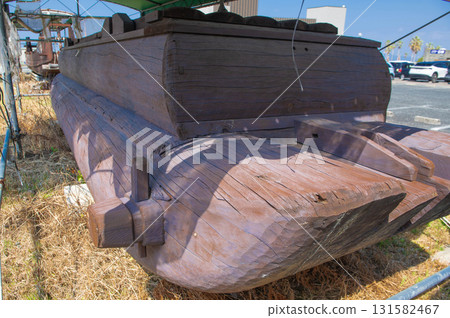 A replica of an ancient ship on display at Uto Marina 131582467