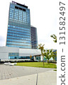 Station Hill Hirakata's observation terrace. A view of the upper floors of buildings over the lawn of the Hirakata Delta 6th floor sky garden. Hirakata City, Osaka Prefecture. 131582497
