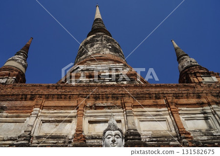 Pagoda and Buddha statue at Wat Yai Chai Mongkhon in Ayutthaya, Thailand 131582675