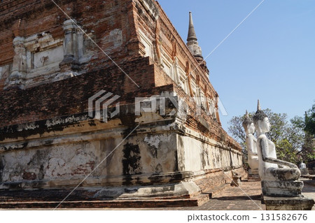Pagoda and Buddha statue at Wat Yai Chai Mongkhon in Ayutthaya, Thailand 131582676