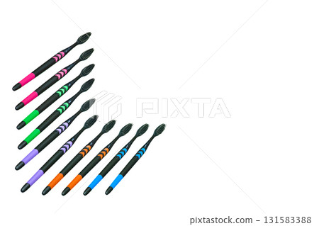 Hygiene.Black toothbrushes with colored inserts isolated on white Hygiene.Black toothbrushes with colored inserts isolated on white 131583388