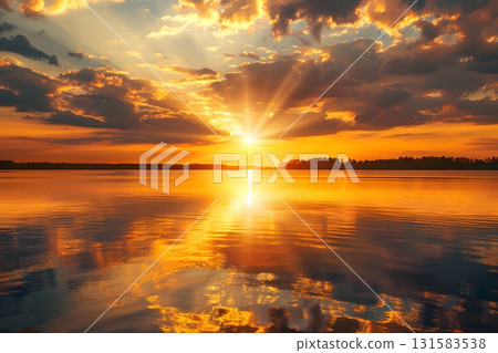 Sunset Colors Dancing Across Calm Lake Surface in Summer Sunset Colors Dancing Across Calm Lake Surface in Summer 131583538