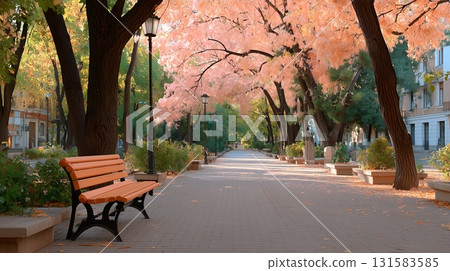 A bench on a park walkway during the autumn foliage season A bench on a park walkway during the autumn foliage season 131583585