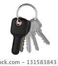 Minimalist Composition Featuring Metal Keys and Keychain on Clean Surface 131583843