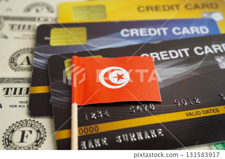 Tunisia flag on credit card, finance economy trading shopping online business. 131583917