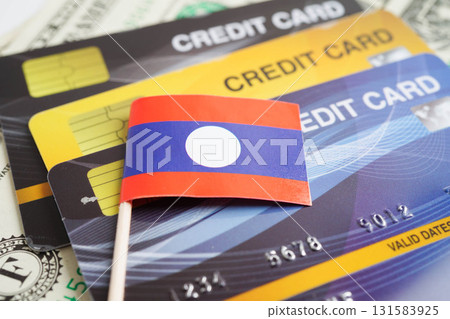 Laos flag on credit card, finance economy trading shopping online business. Laos flag on credit card, finance economy trading shopping online business. 131583925