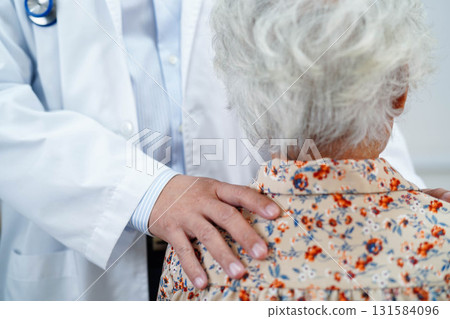 Doctor taking care, help and encourage Asian elder senior woman patient in clinic hospital. Doctor taking care, help and encourage Asian elder senior woman patient in clinic hospital. 131584096