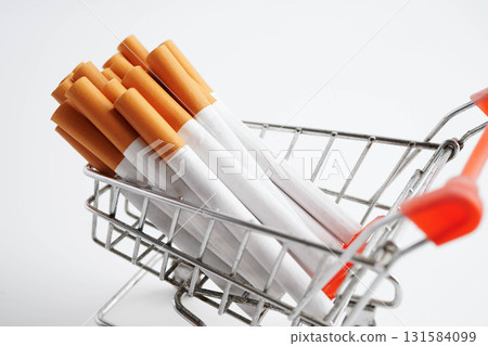 Cigarette in shopping cart, cost, trading, marketing and production, No smoking concept. 131584099