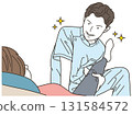 Male chiropractor massaging a female patient's leg 131584572