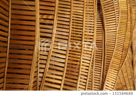 abstract curve pattern that twists and turns smoothly and flows like water waves Made from woven bamboo For building decoration in a modern tropical contemporary style or for making furniture. 131584689