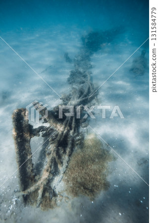 Underwater sea with wreck ship on sandy sea bottom 131584779