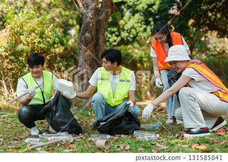 Collaborative environmental stewardship. Volunteers participating in a cleanup project to enhance local ecosystems and promote sustainability. 131585841