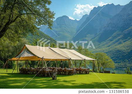Outdoor event setup mountain lake tent gathering scenic nature wide angle relaxation vibes 131586538