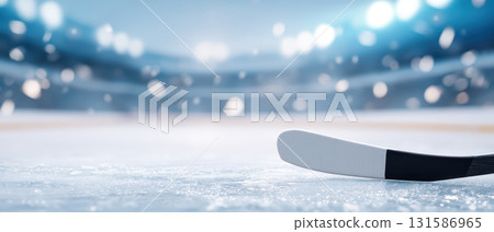 Hockey stick on ice rink with blurred stadium lights, close up, winter sport atmosphere, energetic and dynamic scene, perfect for hockey event banner Hockey stick on ice rink with blurred stadium lights, close up, winter sport atmosphere, energetic and dynamic scene, perfect for hockey event banner 131586965