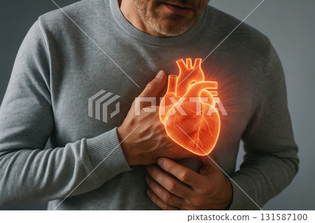 Man holding chest with glowing heart illustration showing medical concern, heart pain, cardiovascular disease, health risk, and urgent need for medical attention, emotional expression of discomfort Man holding chest with glowing heart illustration showing medical concern, heart pain, cardiovascular disease, health risk, and urgent need for medical attention, emotional expression of discomfort 131587100