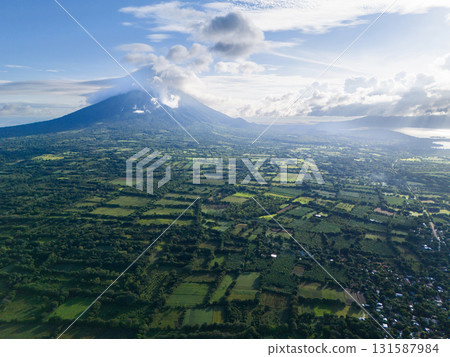 Green meadow valley in Ometepe island 131587984