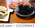 Dinner at the guesthouse: a mountain of seafood: hairy crab, sea urchin, oysters 131590043